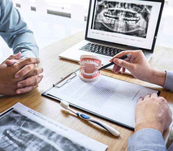 An image that shows a dental consultation in progress